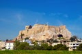 Panoramic view of Acropolis of Athens hill with Parthenon Athena temple and underlying limestone rock base in Athens, Greece