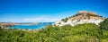 Panoramic view of Acropolis of Lindos, traditional houses and le