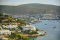 Panoramic View of Aegean sea, traditional white houses marina and Bodrum Castle in Bodrum city of Turkey. Royalty Free Stock Photo