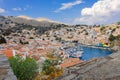 Panoramic view, aerial skyline of small haven of Symi island. Village with tiny beach and colorful houses located on