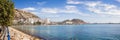 Panoramic view of Alicante beach and Santa Barbara castle with para gliders in Alicante, Spain