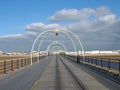 Panoramic view along the pier in southport merseyside with the beach at low tide on a bright summer day with the waterfront Royalty Free Stock Photo