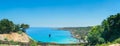 Panoramic view on amazing blue sea near Cape Greco on Cyprus island, Mediterranean Sea. Blue Lagoon Royalty Free Stock Photo