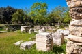 Panoramic view of ancient Athenian Agora archeological area with ruins of Odeon of Agrippa and Gymnasium in Athens, Greece