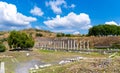 Panoramic view of ancient columns and amphitheater in the ancient city of Asklepion.