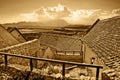 Panoramic view of ancient rural town in sepia