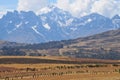 view of the Andes mountain range with few snowfalls in the town of Chincheros in Cuzco Peru