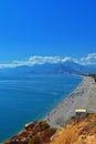 Panoramic view on Antalya beach, mountains and Mediterranean Sea from a ciff. Antalya, Turkey