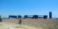 Panoramic view architectural construction with train containers