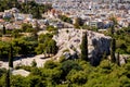 Panoramic view of Areopagus rock - Areios Pagos - seen from Acropolis hill with metropolitan Athens, Greece in background