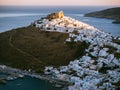 Panoramic view of Astypalaia Chora with the sun setting and a sm