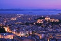 Panoramic view of Athens and Acropolis shot from Lycabettus hill. Parthenon lit up by night lights. Famous iconic view