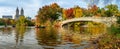 Panoramic view of autumn landscape with Bow bridge in Central Park. New York City. USA Royalty Free Stock Photo