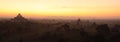 Panoramic view of Bagan during sunrise. Majestic Dhammayan Gyi temple. Royalty Free Stock Photo