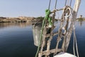 Panoramic view of the bank of the river Nile from a traditional feluca near Aswan, South Egypt.