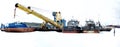 Panoramic view of the barge, river crane and scows standing among ice in the winter parking. Royalty Free Stock Photo