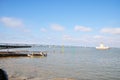 Panoramic view of the Bay of Biscay. Boat of oyster farm workers. View of the great bridge on the Ile d`Oleron.