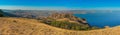 Panoramic view of the bay and the city of Koktebel on a summer evening, the Karadag reserve, Crimea. Royalty Free Stock Photo