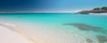 Panoramic view of a a beach of light sand. Sea and sun holiday design theme