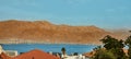 Panoramic view on beach of the Red Sea in Eilat famous resort and recreation town in Israel and Aqaba cities - Jordan Royalty Free Stock Photo