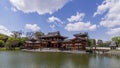 Panoramic view of the beautiful Byodo-in temple in Uji, Kyoto, Japan, on a beautiful sunny day with some clouds Royalty Free Stock Photo