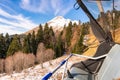 Panoramic view of beautiful mountain landscape with Cable car on ski resort. Snow covered beautiful mountain peak Royalty Free Stock Photo