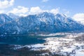 Winter Alpine lake Grundlsee. Embedded in the wonderful mountain massif of the Dead Mountains. Clear cold landscape with blue sky