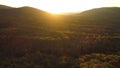 Panoramic view in beautiful orange sunset day of a vast hills and mountains in pristine region of Central America. Shot Royalty Free Stock Photo