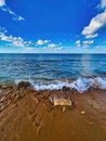 Panoramic view of a beautiful sea on a summer day. Calm morning scenery at the sea. Mysterious island and bright landscape by the Royalty Free Stock Photo