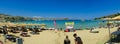 Panoramic view of the beautiful secluded bay and beach at Lindos town on the island of Rhodes, Greece Royalty Free Stock Photo