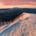 Panoramic view of beautiful winter wonderland mountain scenery in evening light at sunset. Mountains above the clouds. Christmas Royalty Free Stock Photo