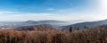 Panoramic view on Beskidy Mountains and Bielsko-Biala city seen from observation tower on Szyndzielnia Mountain. Beautiful autumn Royalty Free Stock Photo