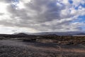 Panoramic view on black stone pebble beach Playa Colmenares near Amarilla, Golf del Sur, Tenerife, Canary Islands, Spain,