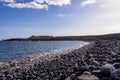 Panoramic view on black stone pebble beach Playa Colmenares near Amarilla, Golf del Sur, Tenerife, Canary Islands, Spain,