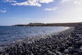 Panoramic view on black stone pebble beach Playa Colmenares near Amarilla, Golf del Sur, Tenerife, Canary Islands, Spain,