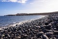 Panoramic view on black stone pebble beach Playa Colmenares near Amarilla, Golf del Sur, Tenerife, Canary Islands, Spain,