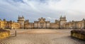 Panoramic view of Blenheim Palace from the gates of the Grand Court in Blenheim, Oxfordshire, UK