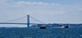 Panoramic view of boats sailing in the sea against Verrazano Bridge in New York city on a sunny day Royalty Free Stock Photo