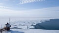 Panoramic view of the border of lake Baikal and the Angara river in Listvyanka village in Russia. The old lighthouse on the shore.