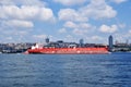 Panoramic view of the Bosphorus. A large ocean ship is sailing along the strait.