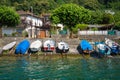 Scenic view of speed boats in Brusino Arsizio on the shore of Lake Lugano, in Switzerland.