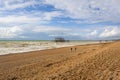 Panoramic view of Brighton`s beach. In the background they are the remains of Brighton West Pier in sea Royalty Free Stock Photo