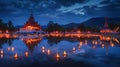 A panoramic view of a Buddhist temple lit by thousands of candles during Visakha Bucha Day at dusk, reflections on a Royalty Free Stock Photo