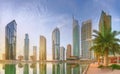 Panoramic view of Business bay and Lake Tower, reflection in a river, Dubai UAE Royalty Free Stock Photo