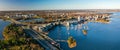 Panoramic view of a business buildings, ocean and a highway