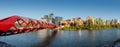 Panoramic view of Calgary with Peace Bridge and downtown skyscrapers in Calgary, Alberta, Canada.