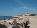 A panoramic view of caorle venice italy city seafront rock promenade Royalty Free Stock Photo