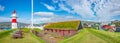 Panoramic view of capital Torshavn of Faroe islands, old and modern harbor, city historical downtown, summer