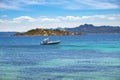 Panoramic view of Caprera Island and Spiaggia di Cala Portese harbor at the Tyrrhenian Sea coastline in Sardinia, Italy