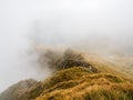 Panoramic view of Carpathian Mountains with extreme weather through the mountains. Royalty Free Stock Photo